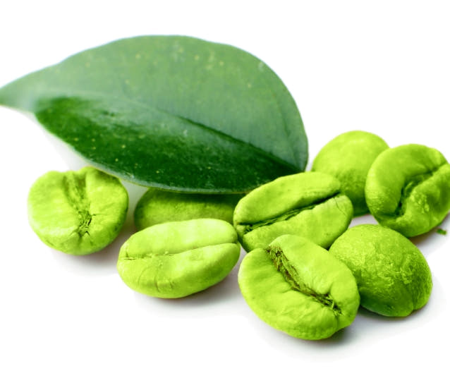 Green coffee beans on white background. 