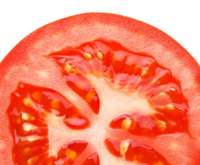 Close-up shot of sliced tomato. 